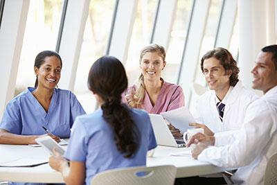 a group of people sitting at a table